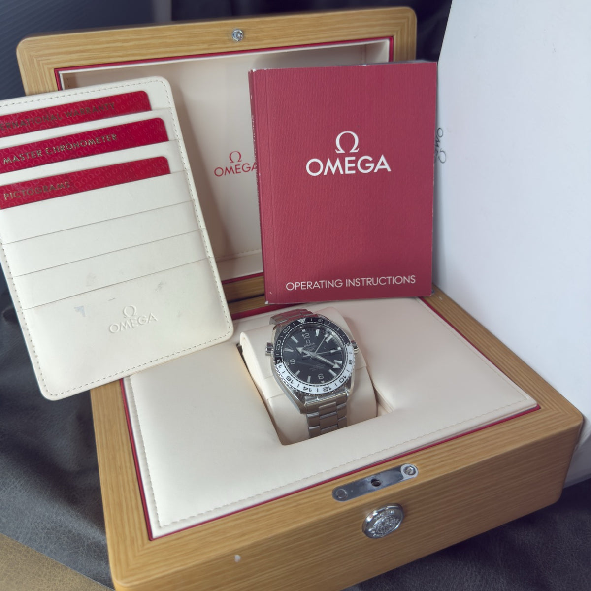 Pre-owned Omega Seamaster Planet Ocean 600M GMT Ref. 215.30.44.22.01.001 — The Crown & Crystal Chandler AZ