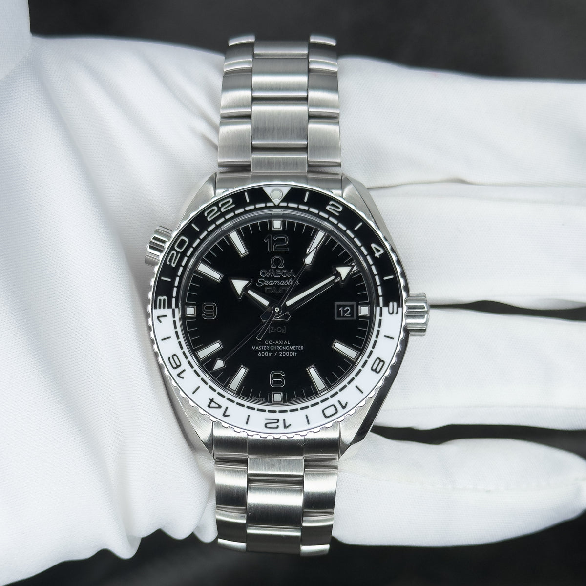 Pre-owned Omega Seamaster Planet Ocean 600M GMT Ref. 215.30.44.22.01.001 — The Crown & Crystal Chandler AZ